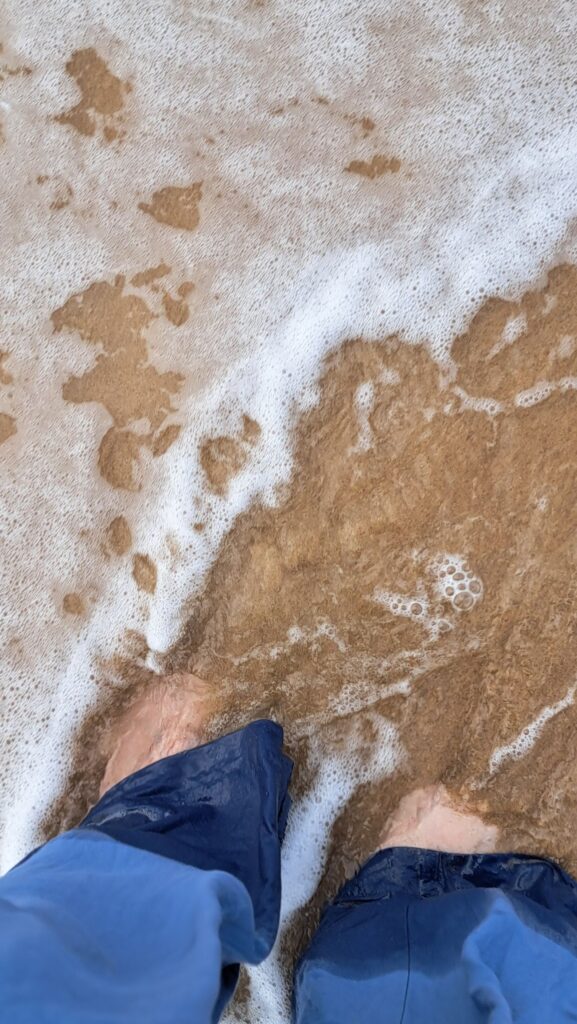 Füße im Meer
